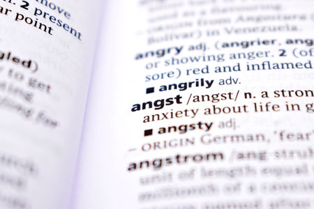 Close Up Of English Dictionary Page With Word - angstの写真素材