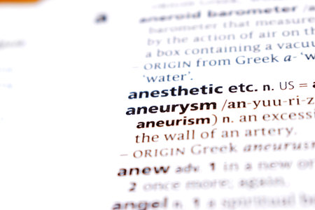 Close Up Of English Dictionary Page With Word - aneurysmの写真素材
