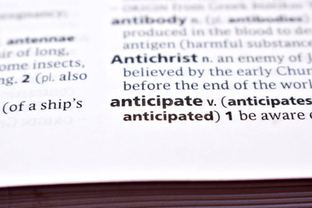 Close Up Of English Dictionary Page With Word - anticipate
