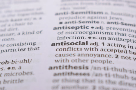 English Definition Dictionary Page Close Up Of Printed Word Of -antisocialの写真素材