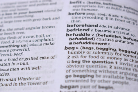English Definition Dictionary Page Close Up Of Printed Word Of -beg