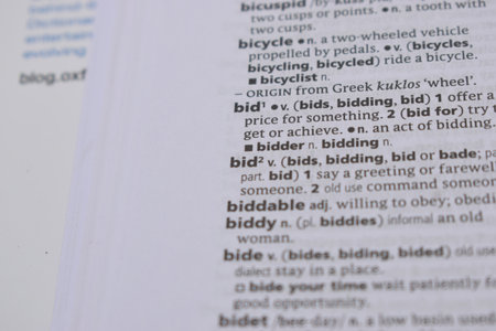 Close Up Of English Dictionary Page With Word - bidの写真素材