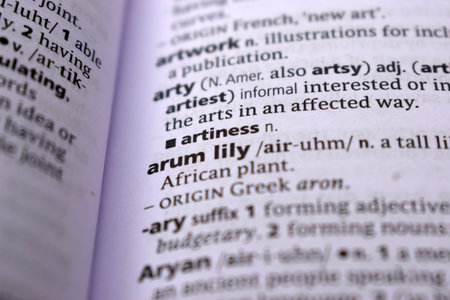 Close Up Of English Dictionary Page With Word - arum lily
