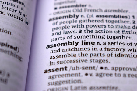 English Definition Page Close Up Of Printed Word Of -assembly lineの写真素材