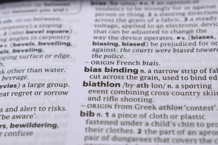 Close Up Of English Dictionary Page With Word - bias bindingの写真素材
