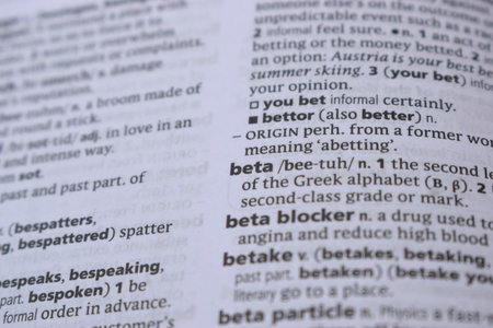 Close Up Of English Dictionary Page With Word - beta