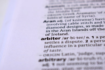 English Definition Dictionary Page Close Up Of Printed Word Of -arbiterの写真素材