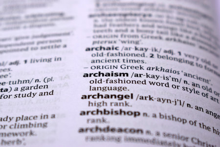 Close Up Of English Dictionary Page With Word - archaismの写真素材