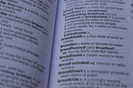 Close Up Of English Definition Dictionary Printed Page Word Of - broadcloth