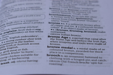 Definition Of English Dictionary Close Up Of Page Print With Word - Bronze Age