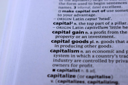Close Up Of English Definition Dictionary Printed Page Word Of -  capital gainの写真素材