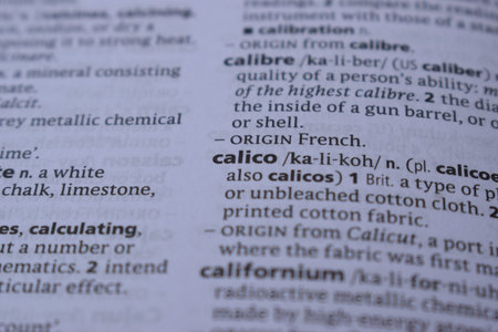 Close Up Of English Definition Dictionary Printed Page Word Of - calico