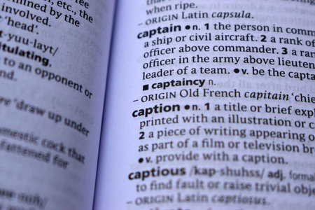 Close Up Of English Definition Dictionary Printed Page Word Of - captaincy