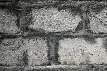 Gray texture: wall with bricks bricks made from expanded clay and concrete - close view