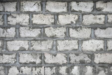 Texture: gray wall with bricks made from expanded clay and concrete - backgroundの写真素材