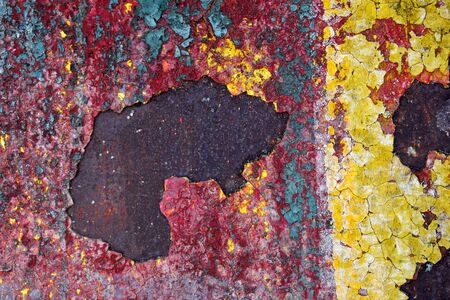 Acid background with red, blue, yellow colors and rust with spot- textureの写真素材