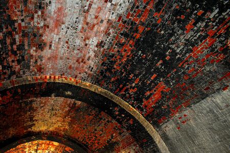 View of the round tunnel or dungeon from ancient white and red bricksの写真素材