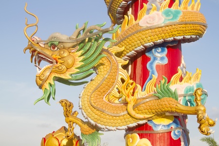 colourful chinese dragon statue in thailandの写真素材