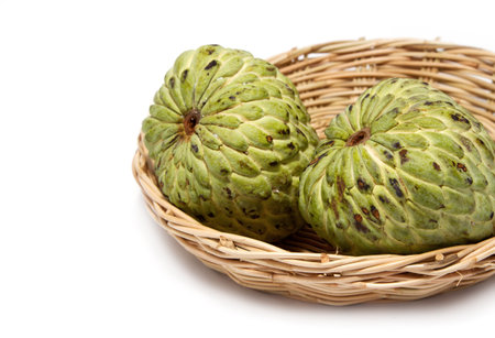 Sugar Apple in basket on white background