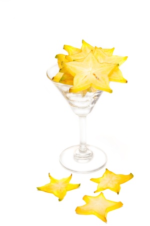 Starfruit, Carambola slice in cocktail grass on white backgroundの写真素材