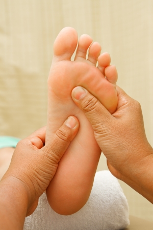 reflexology foot massage, foot spa treatmentの写真素材