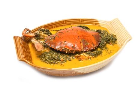 Crab soup with vegetable on white backgroundの写真素材