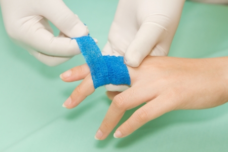 Wound dressing appy medicine  buddy bandage on finger injuryの写真素材