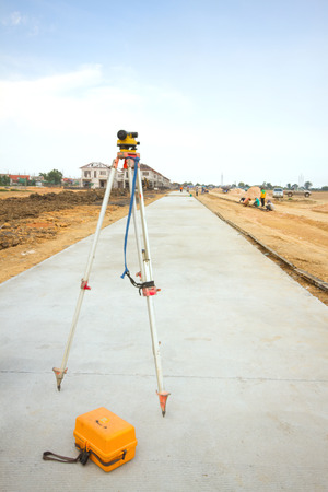 Theodolite set on the edge of road のeditorial素材