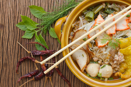Noodle Soup with pork on wooden backgroundの写真素材