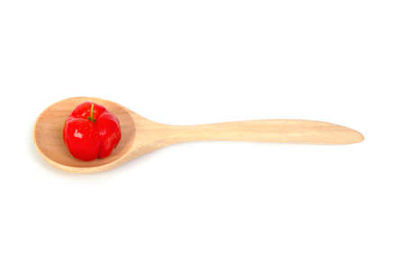Barbado cherry in wooden spoonの写真素材
