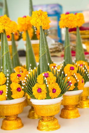 Rice offering ceremony with green leaf banana and flowerの写真素材