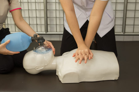 First Aid Instructor Showing Resuscitation CPR Technique