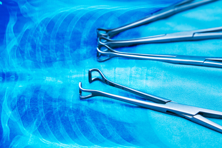 medical  instruments on anatomy blue backgroundの写真素材