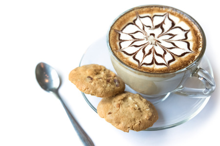 Cup of latte coffee and Homemade cookies on white backgroundの写真素材