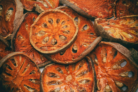 Close up slices of dried bael fruitの写真素材