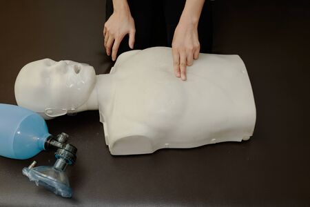 CPR Training nurse resuscitated dummyの写真素材