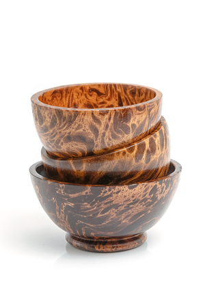 Palm wood bowl isolate on white backgroundの写真素材