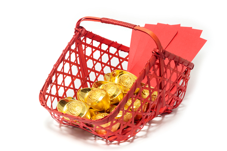 Chinese new year festival decorations, ang pow or red packet and gold ingots.の写真素材