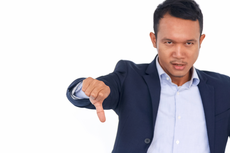 business man showing thumbs downの写真素材