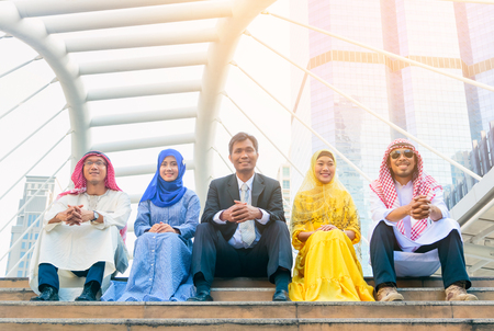 International group of businessmen and women sitting in city, Community Society Global Conceptの写真素材