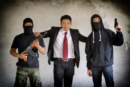 Businessman with bodyguards gangster