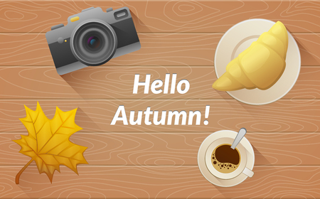 Hallo autumn text. Tasty buttery croissant and cup and camera of hot coffee on old wooden table with yellow leaves. Vector flat illustrationのイラスト素材