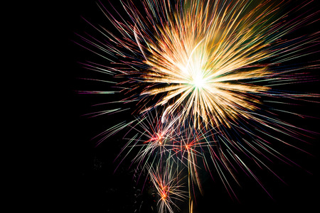 Celebration Happy New Year fireworks with black sky backgroundの写真素材