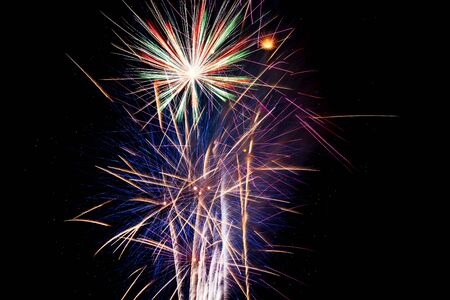 Celebration Happy New Year fireworks with black sky backgroundの写真素材