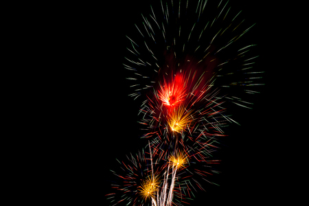 Celebration Happy New Year fireworks with black sky backgroundの写真素材