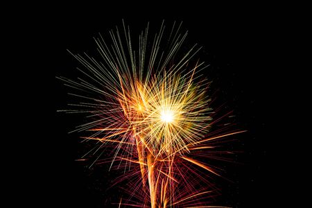 Celebration Happy New Year fireworks with black sky backgroundの写真素材