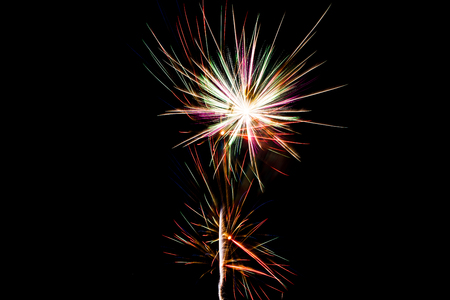 Celebration Happy New Year fireworks with black sky backgroundの写真素材