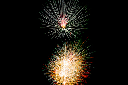 Celebration Happy New Year fireworks with black sky backgroundの写真素材