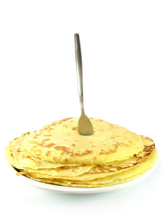 pancakes with a fork on a white background