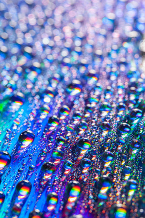 Water drops on multicolor backgroundの写真素材